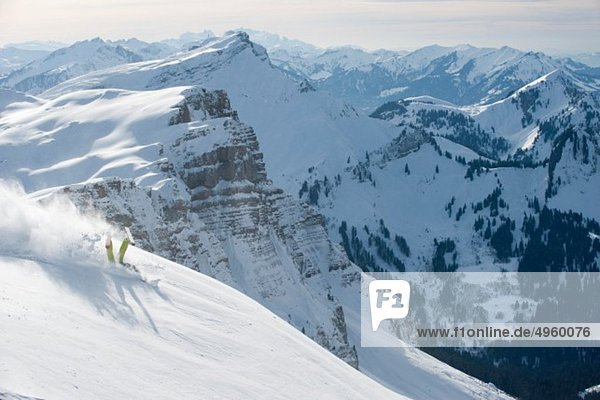 Austria  Kleinwalsertal  man skiing on mountain