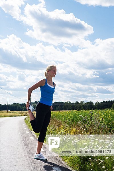 A woman doing stretching exercises  Sweden.