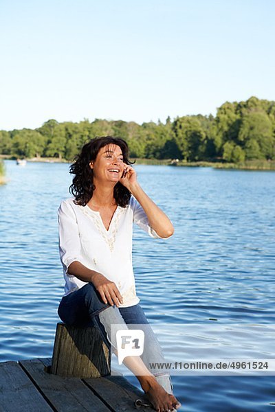 A woman using a mobile phone  Sweden.