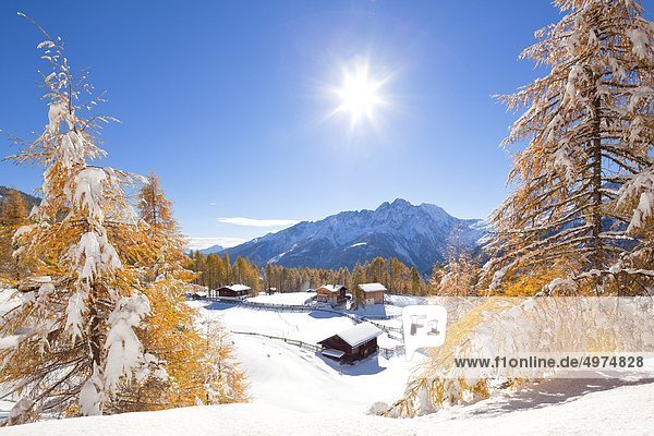 Winterly alpine cabins near Heiligenblut Carinthia Austria