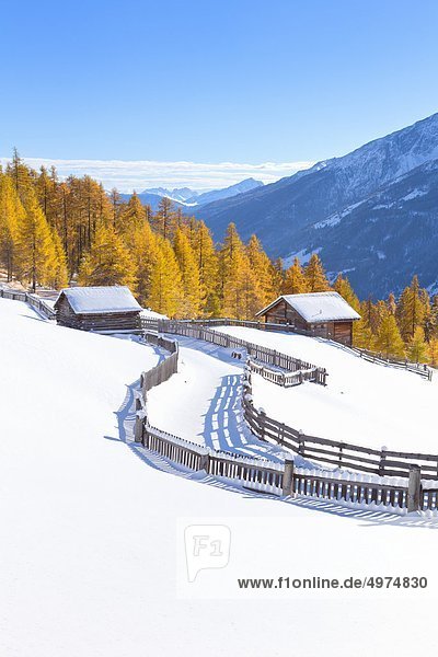 Winterly alpine cabins near Heiligenblut Carinthia Austria