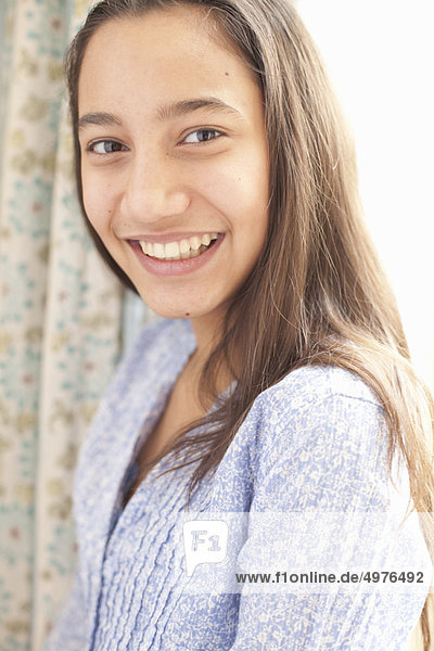 portrait of teenage girl smiling