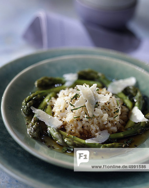 Risotto with green asparagus and parmesan flakes