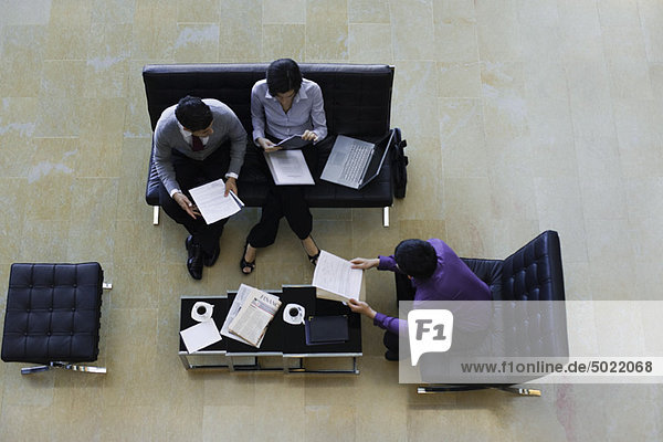 Executives working together  overhead view