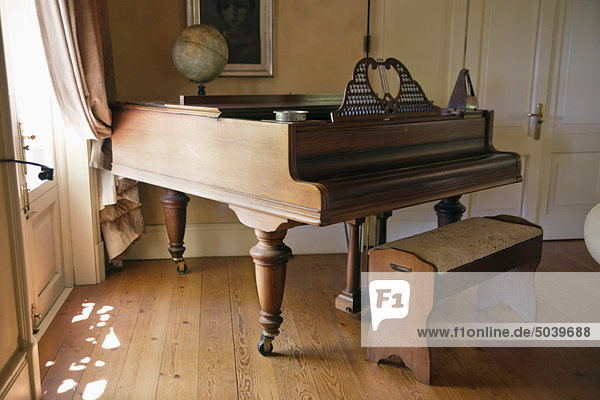 View of piano in living room