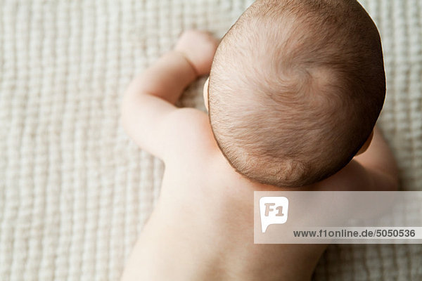Elevated view of baby boy's head