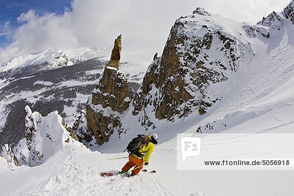 A backcountry skier skiing  Mount Assiniboine  Mount Assiniboine Provincial Park  British Columbia  Canada