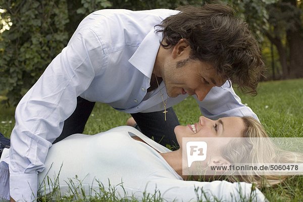 Couple laying in the park