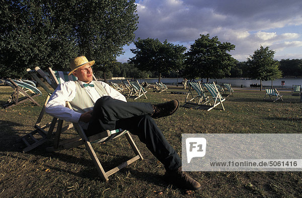 UK  London  Hyde Park  man on a sun chair