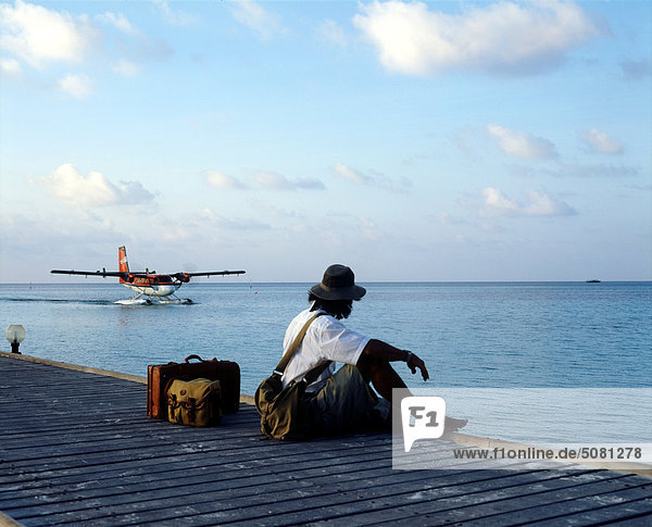 Maldives  Kani Island (Club Med)  Man waiting for seaplane
