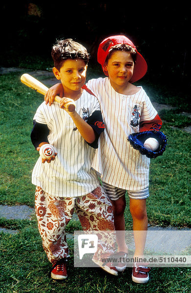 Two boys playing baseball