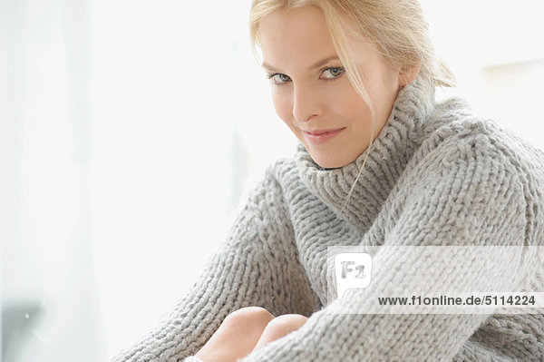 Woman wearing thick sweater