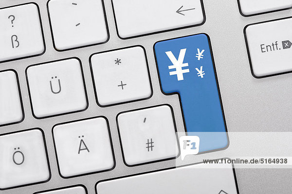 Abbildung der Tastatur mit blauer Taste mit Yen-Symbol  Nahaufnahme