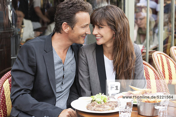 Romantic couple at a restaurant  Paris  Ile-de-France  France