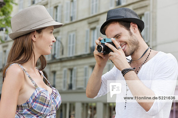 Man taking a picture of a woman  Paris  Ile-de-France  France