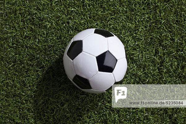 A soccer ball on turf
