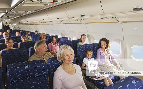 Germany  Munich  Bavaria  People in economy class airliner