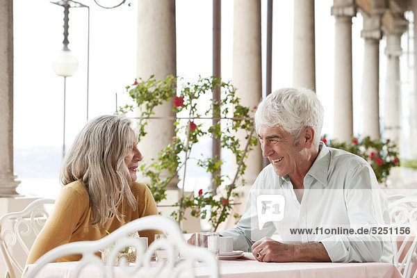 Senior couple in a restaurant  Italy  Gardone Riviera