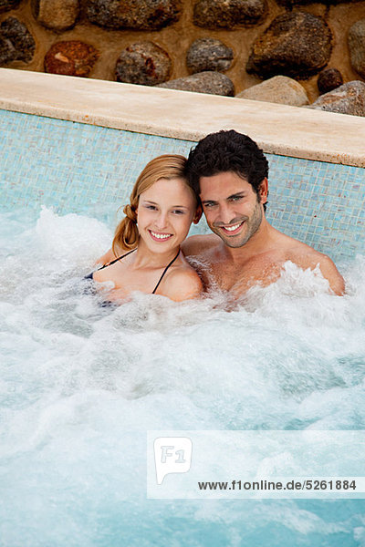 Young couple in hot tub  portrait