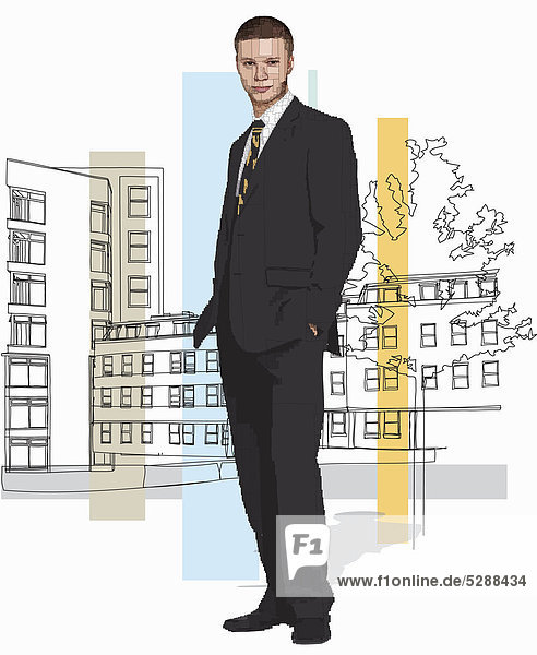 Young businessman standing on city street