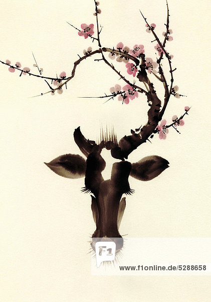 Blossom branches growing from cow's head