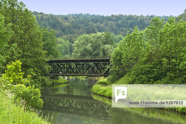 Old railway bridge over the river Pegnitz in Enzendorf  Bavaria  Germany  Europe