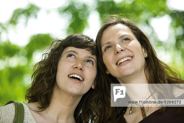 Female friends together outdoors  portrait