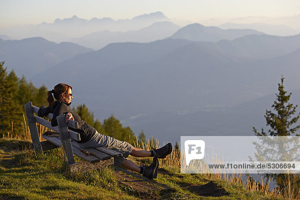Female hiker resting  Carinthia  Austria  Europe