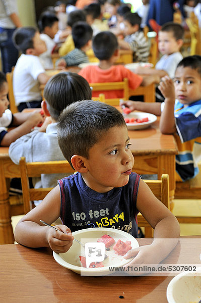 Boy in the refectory in an orphanage  Queretaro  Mexico  North America  Latin America