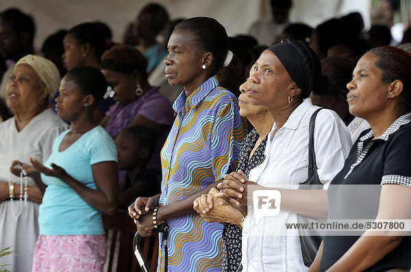 Faithful women during church service  Turgeau district  Port-au-Prince  Haiti  Caribbean  Central America