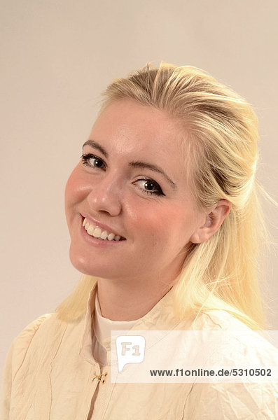 Portrait of a smiling young blonde Swedish woman