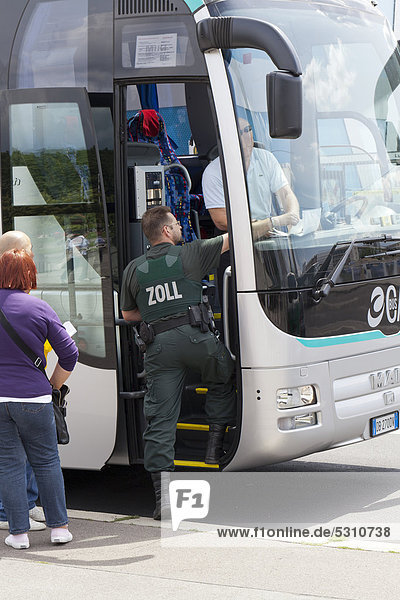 Customs officers inspecting a bus in Berlin Mitte  Germany  Europe