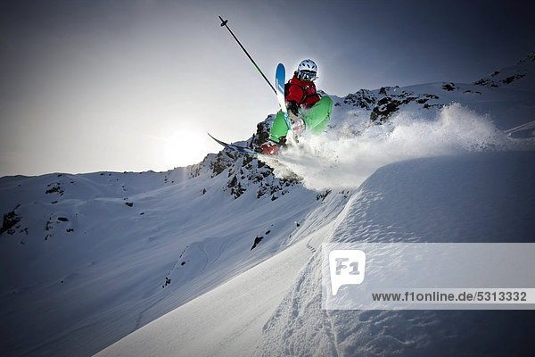 Freerider  skier jumping  snowy landscape  northern Tyrol  Austria  Europe