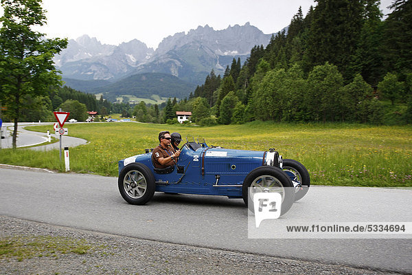 Bugatti T 51  1931 model  Wilder Kaiser mountain range at back  Kitzbuehel Alpine Rally 2011  Tyrol  Austria  Europe