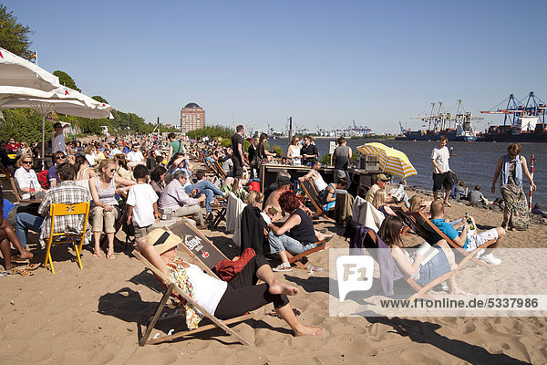 Crowded beach bar at the river Elbe shore in Oevelgoenne  Hanseatic City of Hamburg  Germany  Europe