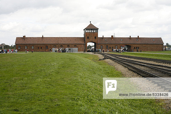 Entrance gate and rail tracks to the concentration camp  Auschwitz-Birkenau  Poland  Europe