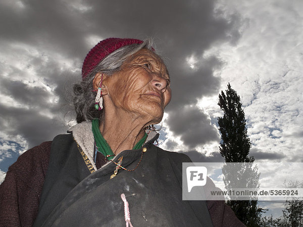 Ladakhi woman  looking sorrowful  Lamayuru  Jammu and Kashmir  India  Asia