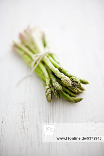 Fresh asparagus tied with string