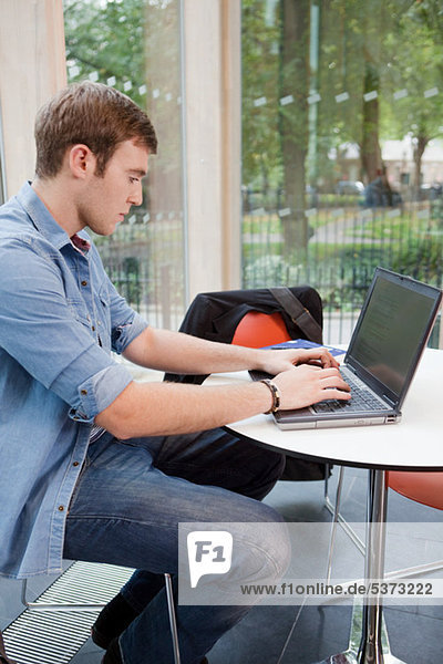 University student working on laptop