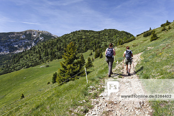 Mountaineers climbing Monte Altissimo mountain above Nago-Torbole  Lake Garda  Monte Altissimo mountain at the back  province of Trentino  Italy  Europe