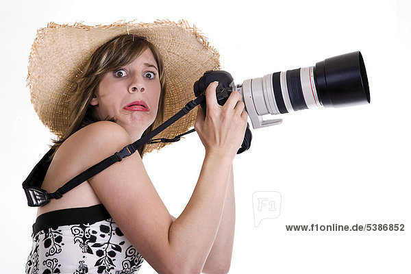 Junge Frau mit Digitalkamera