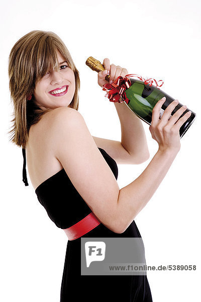 Junge Frau mit Champagnerflasche