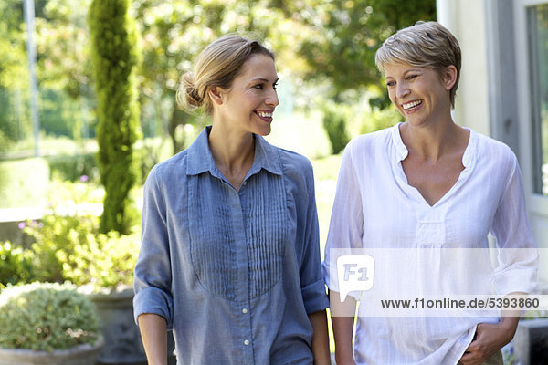 Two mature women walking together