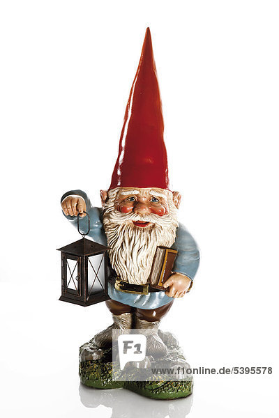 Large garden gnome holding a latern
