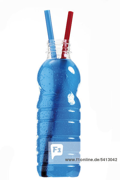 Bottle of energy drink with straws