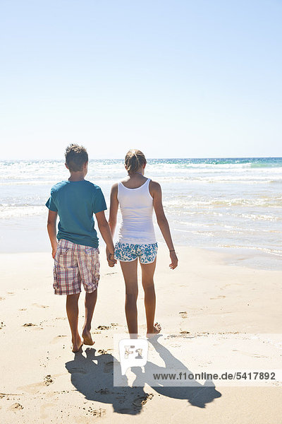 Teenage couple at beach