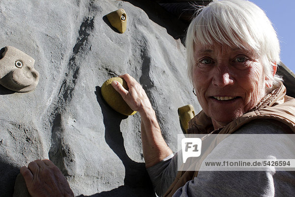 Elderly woman  senior citizen  climbing