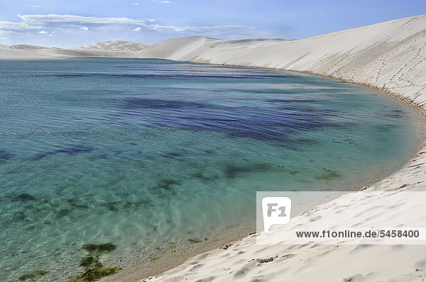 Crystal-clear lagoon in the desert of LenÁÛis Maranhenses Maranh„o Brazil South America
