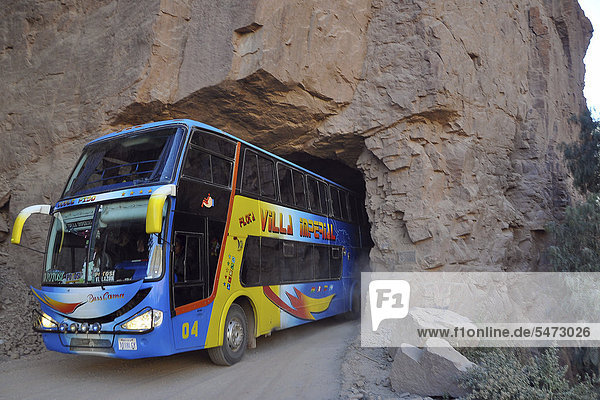 Coach driving through narrow tunnel  Tupiza  Departamento Potosi  Bolivia  South America