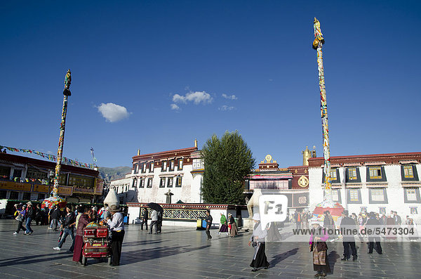 Tibetan Buddhism  pilgrims and monks in front of Jokhang Temple  Tibet's most holy temple  Barkhor  Lhasa  Tibet  China  Asia
